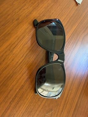 Persol Black Frame Sunglasses with Dark Lenses